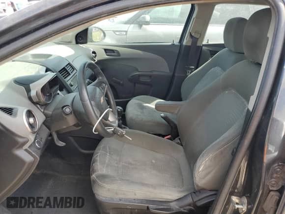 2016 Chevrolet Sonic LS with VIN 1G1JB6SHXG4108187, listed as a Copart auction lot 65235995 with 145,931 mi miles and Clean title. Bid and sale history available at DreamBid. Image 7.