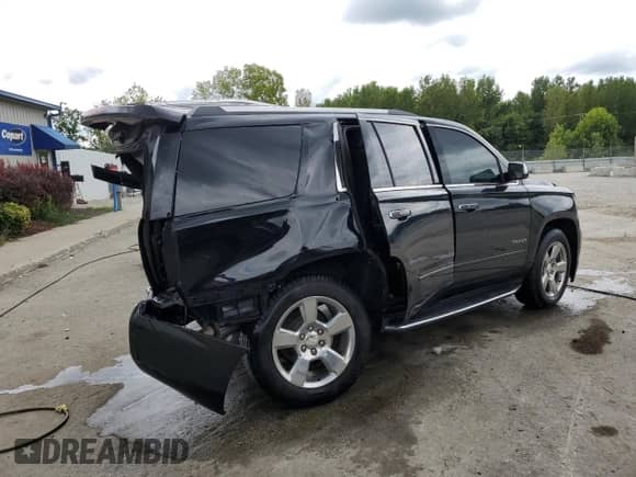 2019 Chevrolet Tahoe Premier с VIN 1GNSCCKC8KR260631, выставлен на аукционе Copart как лот 72052205 с пробегом 98 975 миль миль и Списание • Salvage title. История ставок и продаж доступна на DreamBid. Изображение 3.
