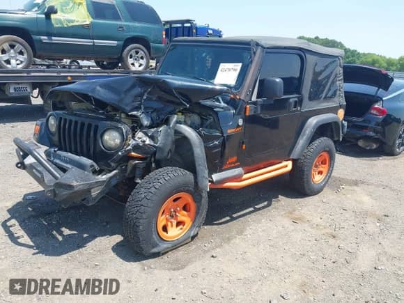 2006 Jeep Wrangler Sport z VIN 1J4FA49S16P784119, wystawiony jako IAAI lot #42470790 z przebiegiem Nie podano mil oraz . Historia ofert i sprzedaży dostępna na DreamBid. Obrazek 18.