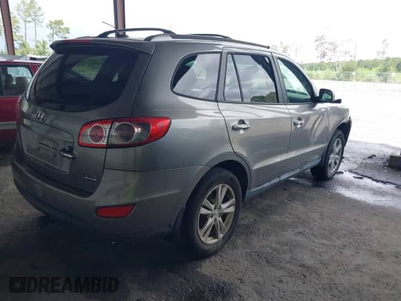 2011 Hyundai Santa Fe Limited z VIN 5XYZK3AB8BG039970, wystawiony jako IAAI lot #43027463 z przebiegiem 186 781 mil mil oraz . Historia ofert i sprzedaży dostępna na DreamBid. Obrazek 4.