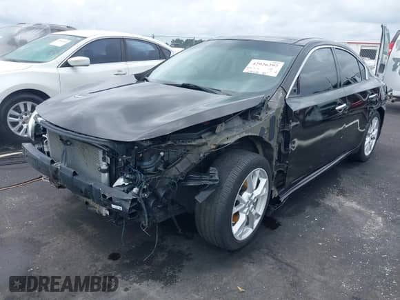 2014 Nissan Maxima SV z VIN 1N4AA5AP8EC444040, wystawiony jako IAAI lot #42926297 z przebiegiem 100 800 mil mil oraz . Historia ofert i sprzedaży dostępna na DreamBid. Obrazek 21.