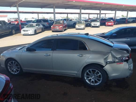 2012 Chevrolet Malibu LTZ 1LZ z VIN 1G1ZE5E06CF214418, wystawiony jako IAAI lot #43450311 z przebiegiem 177 772 mil mil oraz . Historia ofert i sprzedaży dostępna na DreamBid. Obrazek 14.