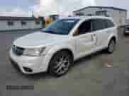 2013 Dodge Journey R/T with VIN 3C4PDDFG0DT708627, listed as a Copart auction lot 66959915 with 228,491 mi miles and Salvage title. Bid and sale history available at DreamBid. Image 1.