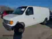 2003 Ford Econoline Cargo with VIN 1FTNE24L23HA98641, listed as a IAAI auction lot 41285948 with 257,510 mi miles and . Bid and sale history available at DreamBid. Image 2.