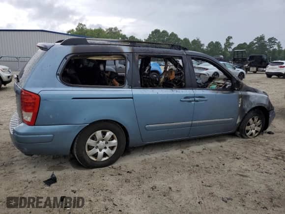 2007 Hyundai Entourage GLS с VIN KNDMC233576039832, выставлен на аукционе Copart как лот 67734965 с пробегом Не указан миль и Чистый • Clean title. История ставок и продаж доступна на DreamBid. Изображение 3.