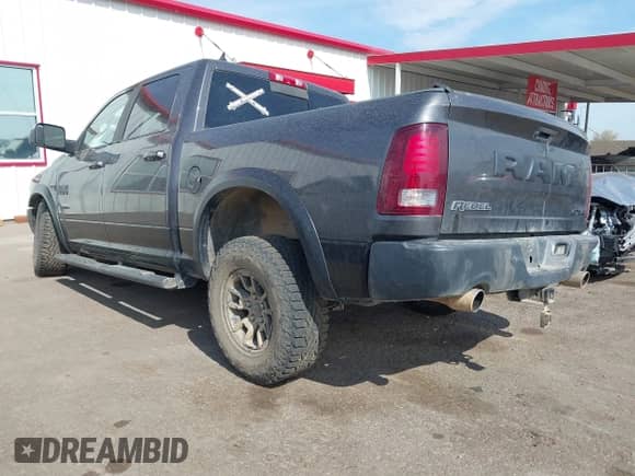 2018 Ram 1500 Rebel с VIN 1C6RR7YT8JS122252, выставлен на аукционе IAAI как лот 43013604 с пробегом 90 857 миль миль и . История ставок и продаж доступна на DreamBid. Изображение 3.