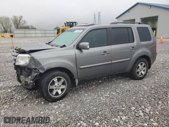 2009 Honda Pilot Touring with VIN 5FNYF38879B002632, listed as a Copart auction lot 82134795 with Not provided miles and Salvage title. Bid and sale history available at DreamBid. Image 1.