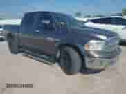 2014 Ram 1500 Laramie with VIN 1C6RR6NT3ES172884, listed as a IAAI auction lot 42809114 with 233,024 mi miles and . Bid and sale history available at DreamBid. Image 1.