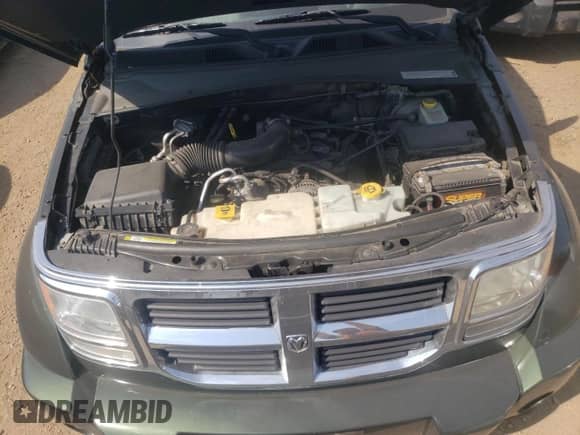 2010 Dodge Nitro SE with VIN 1D4PT2GK8AW124799, listed as a Copart auction lot 71811164 with 108,013 mi miles and Salvage title. Bid and sale history available at DreamBid. Image 11.