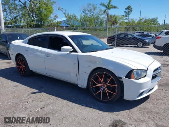 2014 Dodge Charger SE with VIN 2C3CDXBG9EH315018, listed as a IAAI auction lot 41754604 with 103,676 mi miles and . Bid and sale history available at DreamBid. Image 1.