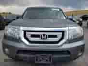 2009 Honda Pilot Touring with VIN 5FNYF48829B014693, listed as a Copart auction lot 65152355 with 160,961 mi miles and Salvage title. Bid and sale history available at DreamBid. Image 5.