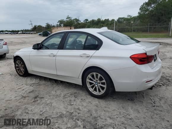 2017 BMW 3 Series 320i with VIN WBA8E1G53HNU13554, listed as a Copart auction lot 80698265 with 101,651 mi miles and Salvage title. Bid and sale history available at DreamBid. Image 2.