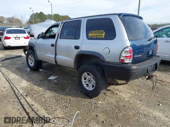 2003 Dodge Durango Sport z VIN 1D4HS38N93F580870, wystawiony jako IAAI lot #41100609 z przebiegiem 261 174 mil mil oraz . Historia ofert i sprzedaży dostępna na DreamBid. Obrazek 3.
