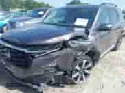 2023 Honda Pilot Elite with VIN 5FNYG1H8XPB040628, listed as a IAAI auction lot 42718726 with 28,663 mi miles and . Bid and sale history available at DreamBid. Image 6.