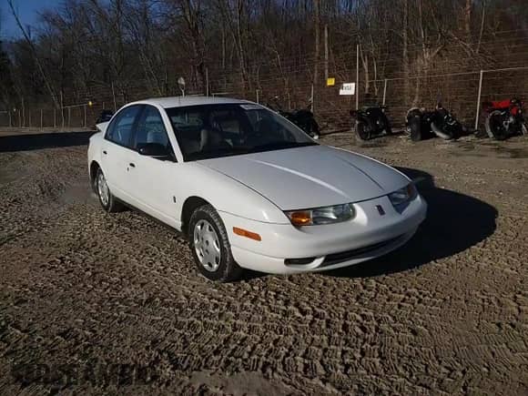 2000 Saturn SL with VIN 1G8ZH5281YZ240482, listed as a Copart auction lot 47728225 with 144,946 mi miles and Salvage title. Bid and sale history available at DreamBid. Image 10.