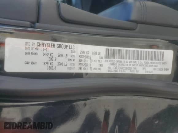 2012 Jeep Grand Cherokee Overland z VIN 1C4RJFCGXCC187959, wystawiony jako Copart lot #85349525 z przebiegiem 105 327 mil mil oraz Szkoda całkowita • Salvage title. Historia ofert i sprzedaży dostępna na DreamBid. Obrazek 13.