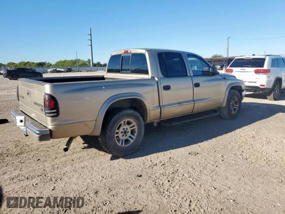 2004 Dodge Dakota SLT with VIN 1D7HL48N34S780674, listed as a Copart auction lot 90371305 with 201,955 mi miles and Clean title. Bid and sale history available at DreamBid. Image 3.