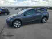 2023 Tesla Model Y Long Range с VIN 7SAYGDEE1PA166467, выставлен на аукционе Copart как лот 60252694 с пробегом 20 216 миль миль и Списание • Salvage title. История ставок и продаж доступна на DreamBid. Изображение 1.