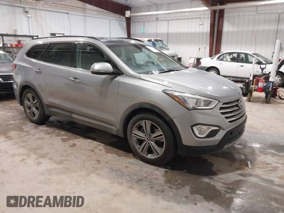 2015 Hyundai Santa Fe GLS with VIN KM8SRDHF3FU094225, listed as a IAAI auction lot 41546435 with 122,538 mi miles and . Bid and sale history available at DreamBid. Image 1.