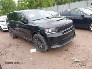 2018 Dodge Durango R/T with VIN 1C4SDJCTXJC219282, listed as a IAAI auction lot 42361607 with 153,523 mi miles and . Bid and sale history available at DreamBid. Image 1.