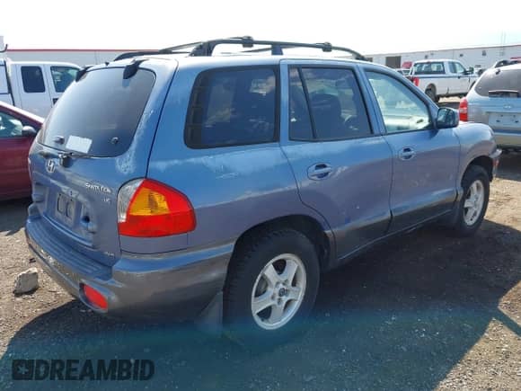 2002 Hyundai Santa Fe GLS z VIN KM8SC73D92U302739, wystawiony jako IAAI lot #42795338 z przebiegiem 169 254 mil mil oraz . Historia ofert i sprzedaży dostępna na DreamBid. Obrazek 4.