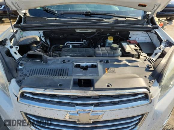 2015 Chevrolet Trax LTZ z VIN 3GNCJTSB8FL217891, wystawiony jako Copart lot #70113235 z przebiegiem 108 513 mil mil oraz Szkoda całkowita • Salvage title. Historia ofert i sprzedaży dostępna na DreamBid. Obrazek 11.