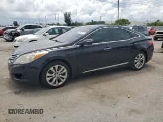 2013 Hyundai Azera с VIN KMHFG4JG2DA261750, выставлен на аукционе Copart как лот 69497154 с пробегом Не указан миль и Списание • Salvage title. История ставок и продаж доступна на DreamBid. Изображение 1.