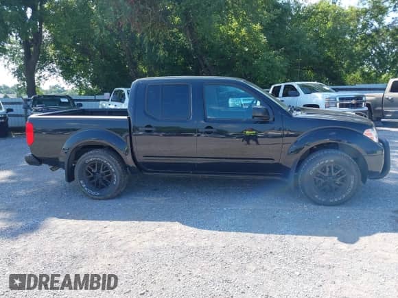 2019 Nissan Frontier SV z VIN 1N6DD0EV3KN798118, wystawiony jako IAAI lot #42810355 z przebiegiem 50 342 mil mil oraz . Historia ofert i sprzedaży dostępna na DreamBid. Obrazek 13.