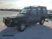 2001 Land Rover Discovery z VIN SALTW12451A708797, wystawiony jako Copart lot #43953955 z przebiegiem 125 768 mil mil oraz Czysty tytuł • Clean title. Historia ofert i sprzedaży dostępna na DreamBid. Obrazek 1.