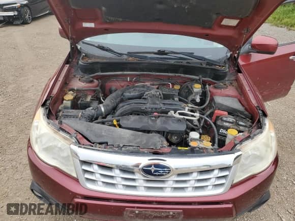 2011 Subaru Forester X Limited z VIN JF2SHCDC7BG761322, wystawiony jako Copart lot #67041975 z przebiegiem 178 841 mil mil oraz Czysty tytuł • Clean title. Historia ofert i sprzedaży dostępna na DreamBid. Obrazek 12.