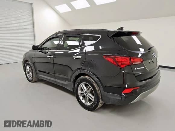 2018 Hyundai Santa Fe 2.4L with VIN 5NMZUDLB5JH059174, listed as a Copart auction lot 81554615 with 98,680 mi miles and Clean title. Bid and sale history available at DreamBid. Image 2.