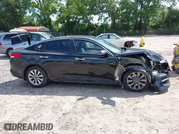 2016 Kia Optima EX z VIN 5XXGU4L34GG053308, wystawiony jako IAAI lot #42446166 z przebiegiem 127 971 mil mil oraz . Historia ofert i sprzedaży dostępna na DreamBid. Obrazek 13.