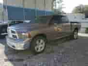 2009 Dodge 1500 SLT with VIN 1D3HB13T09S736549, listed as a Copart auction lot 73873824 with 176,610 mi miles and Salvage title. Bid and sale history available at DreamBid. Image 1.