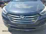 2015 Hyundai Santa Fe with VIN 5XYZT3LB0FG257577, listed as a IAAI auction lot 43133881 with Not provided miles and . Bid and sale history available at DreamBid. Image 12.