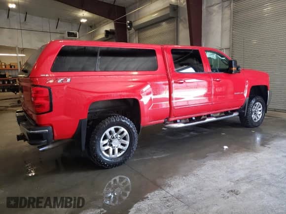 2018 Chevrolet Silverado 3500HD LT with VIN 1GC1KZEG6JF145213, listed as a Copart auction lot 68697915 with 99,074 mi miles and Salvage title. Bid and sale history available at DreamBid. Image 3.