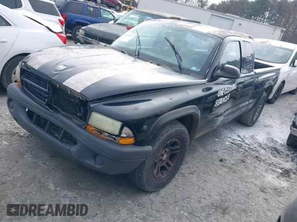 2003 Dodge Dakota с VIN 1D7HL12X83S135638, выставлен на аукционе IAAI как лот 41472267 с пробегом 181 349 миль миль и . История ставок и продаж доступна на DreamBid. Изображение 2.