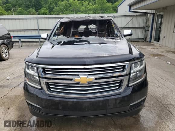 2015 Chevrolet Suburban LTZ с VIN 1GNSKKKC8FR249387, выставлен на аукционе Copart как лот 59060575 с пробегом Не указан миль и Списание • Salvage title. История ставок и продаж доступна на DreamBid. Изображение 5.