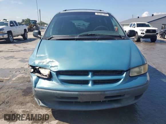 1999 Dodge Caravan SE with VIN 2B4GP44G9XR204463, listed as a Copart auction lot 64301385 with 291,785 mi miles and Salvage title. Bid and sale history available at DreamBid. Image 5.