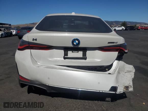 2022 BMW i4 eDrive40 with VIN WBY73AW01NFM83830, listed as a Copart auction lot 67808055 with 19,938 mi miles and Salvage title. Bid and sale history available at DreamBid. Image 6.