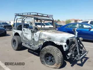 2002 Jeep Wrangler Sport z VIN 1J4FA49S72P715171, wystawiony jako IAAI lot #42574376 z przebiegiem Nie podano mil oraz . Historia ofert i sprzedaży dostępna na DreamBid. Obrazek 1.