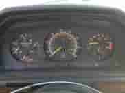 1990 Mercedes-Benz 300 CE с VIN WDBEA51D7LB092653, выставлен на аукционе Copart как лот 77023794 с пробегом 141 095 миль миль и Чистый • Clean title. История ставок и продаж доступна на DreamBid. Изображение 9.