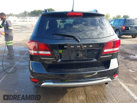 2016 Dodge Journey Crossroad Plus z VIN 3C4PDCGB2GT172264, wystawiony jako IAAI lot #43392210 z przebiegiem 149 878 mil mil oraz . Historia ofert i sprzedaży dostępna na DreamBid. Obrazek 17.