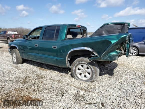 2003 Dodge Dakota SLT with VIN 1D7HL48N93S220107, listed as a Copart auction lot 49046485 with Not provided miles and Clean title. Bid and sale history available at DreamBid. Image 2.