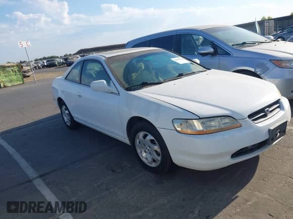 1999 Honda Accord EX z VIN 1HGCG3278XA021639, wystawiony jako IAAI lot #43090212 z przebiegiem 231 561 mil mil oraz . Historia ofert i sprzedaży dostępna na DreamBid. Obrazek 1.