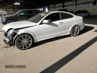 2015 Mercedes-Benz C 250 with VIN WDDGJ4HB2FG406926, listed as a Copart auction lot 64459115 with 104,031 mi miles and Salvage title. Bid and sale history available at DreamBid. Image 1.
