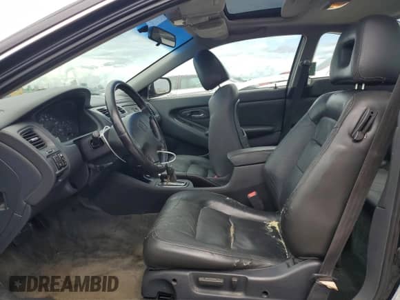 2002 Honda Accord EX with VIN 1HGCG22522A001582, listed as a Copart auction lot 70493645 with 188,612 mi miles and Salvage title. Bid and sale history available at DreamBid. Image 7.