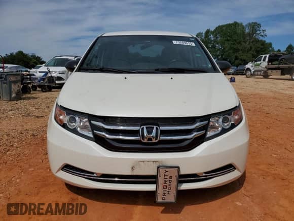 2015 Honda Odyssey LX z VIN 5FNRL5H29FB129947, wystawiony jako Copart lot #70269615 z przebiegiem 85 974 mil mil oraz Szkoda całkowita • Salvage title. Historia ofert i sprzedaży dostępna na DreamBid. Obrazek 5.