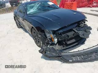 2021 Ford Mustang EcoBoost z VIN 1FA6P8TH0M5126377, wystawiony jako IAAI lot #42585538 z przebiegiem 84 515 mil mil oraz . Historia ofert i sprzedaży dostępna na DreamBid. Obrazek 1.