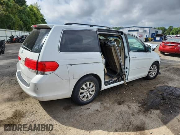 2010 Honda Odyssey EX with VIN 5FNRL3H48AB087382, listed as a Copart auction lot 81276685 with 150,961 mi miles and Salvage title. Bid and sale history available at DreamBid. Image 3.