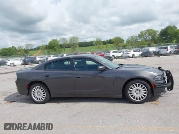 2020 Dodge Charger Police z VIN 2C3CDXKT4LH120180, wystawiony jako IAAI lot #42834441 z przebiegiem 128 459 mil mil oraz . Historia ofert i sprzedaży dostępna na DreamBid. Obrazek 13.